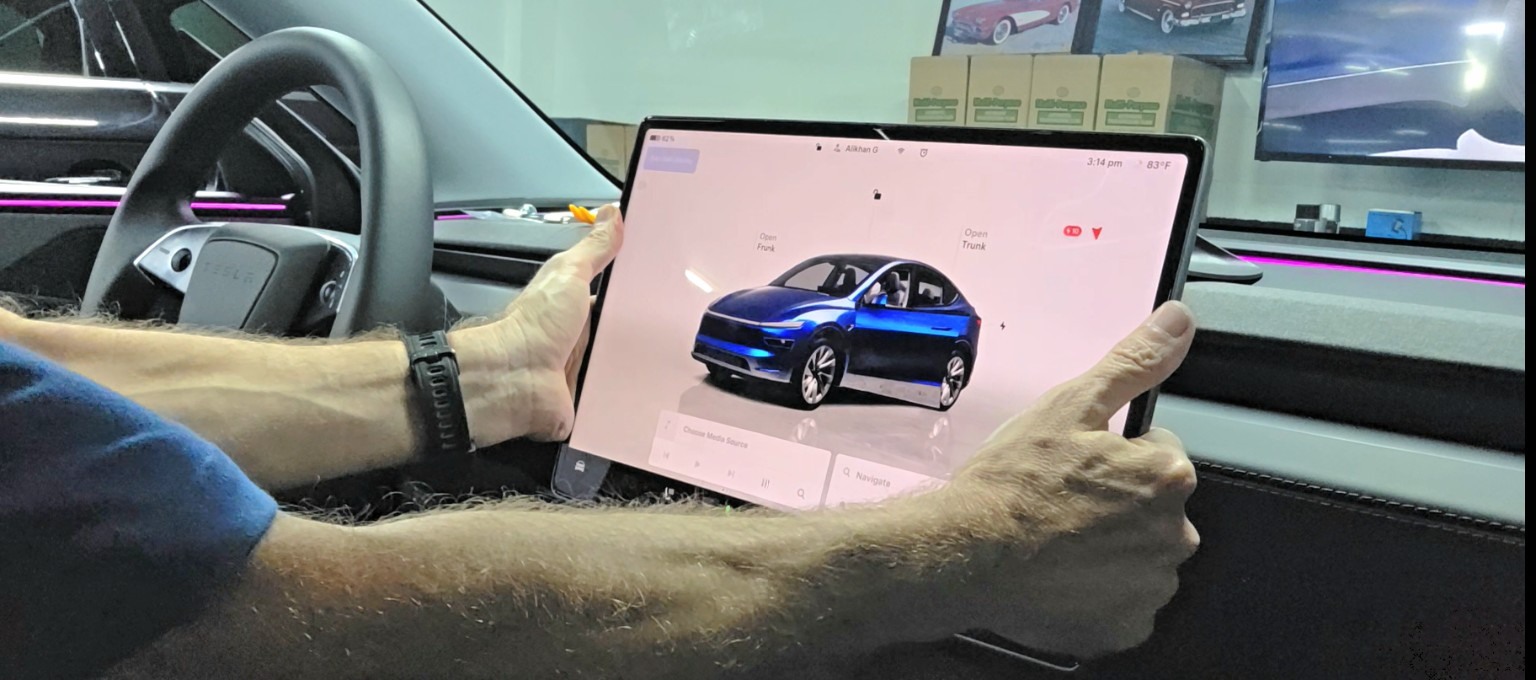 Tesla swivel screen mount work at Honest Auto Works